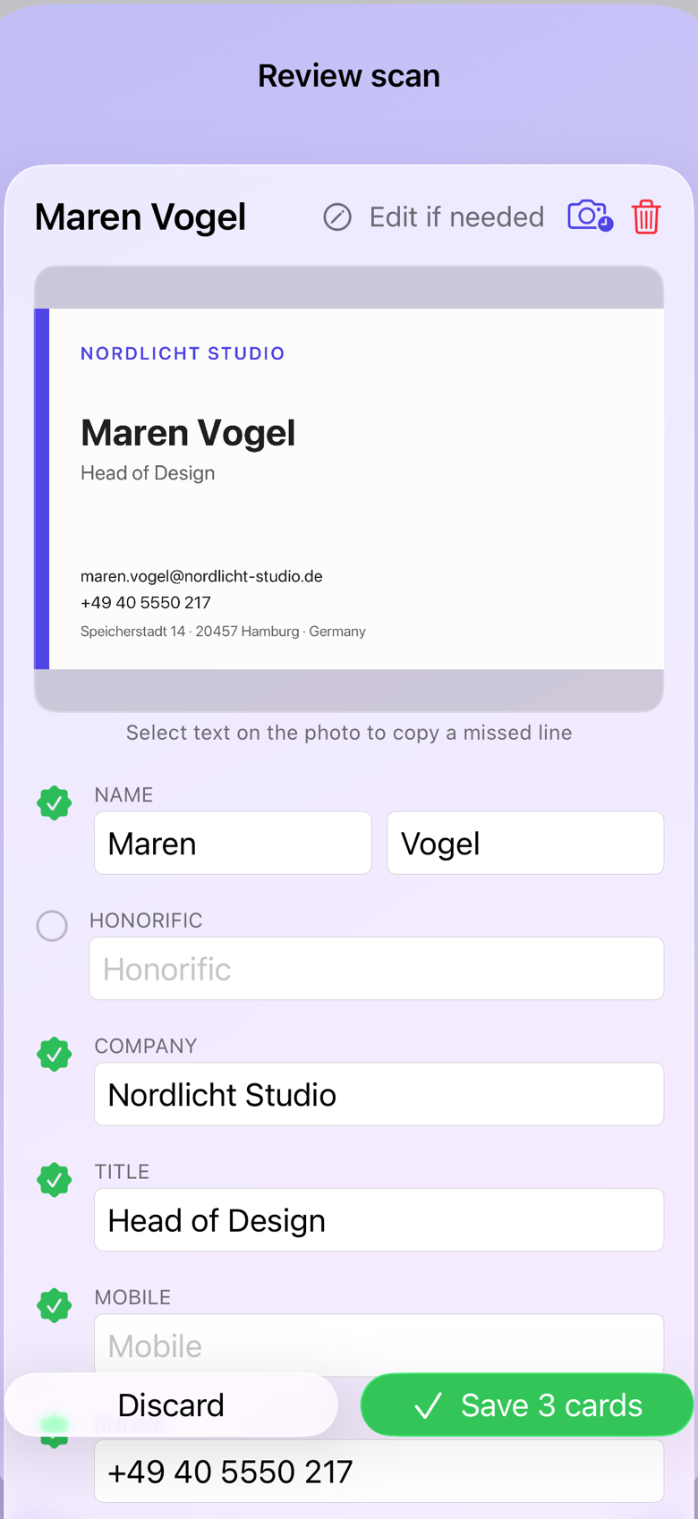 cardlio on iPhone reviewing a freshly scanned business card with validated fields